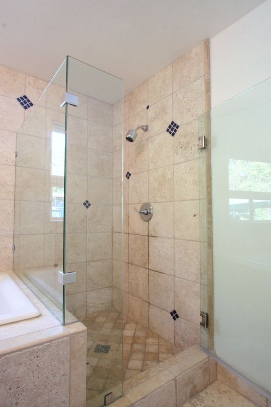 elegant glass shower door highlighting tile