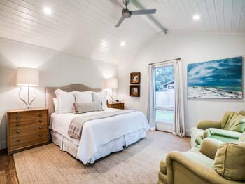 A bright open concept guest bedroom