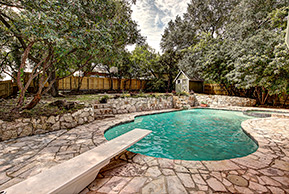 New stone patio with pool